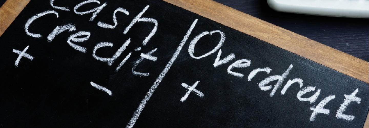 a chalk board with cash credit and overdraft writing